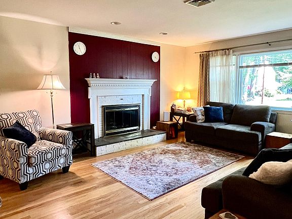 Large Living Room w/Wood Burning Fireplace.