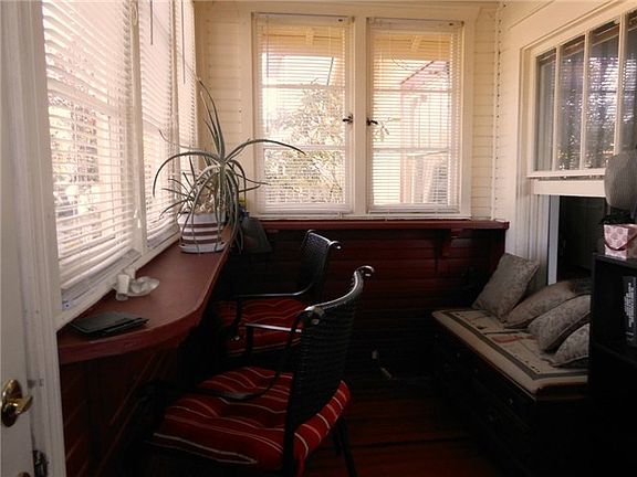 Sunny enclosed entry porch.