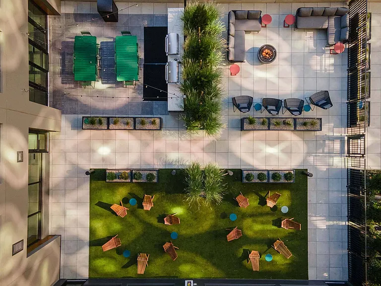 Enjoy the spacious grassy patio, complete with plenty of seating for ultimate comfort.