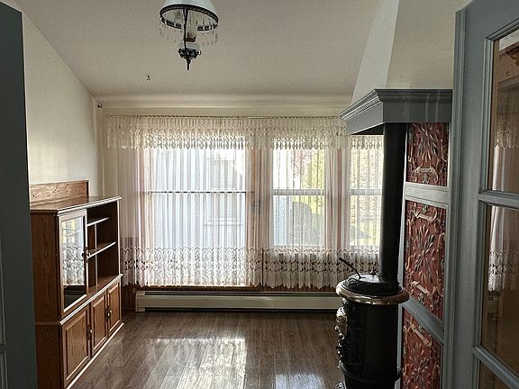 Family room with gas pot-bellied stove