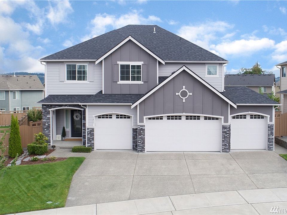 BEAUTIFUL HOME...4 CAR GARAGE AND WONDERFUL CURB APPEAL