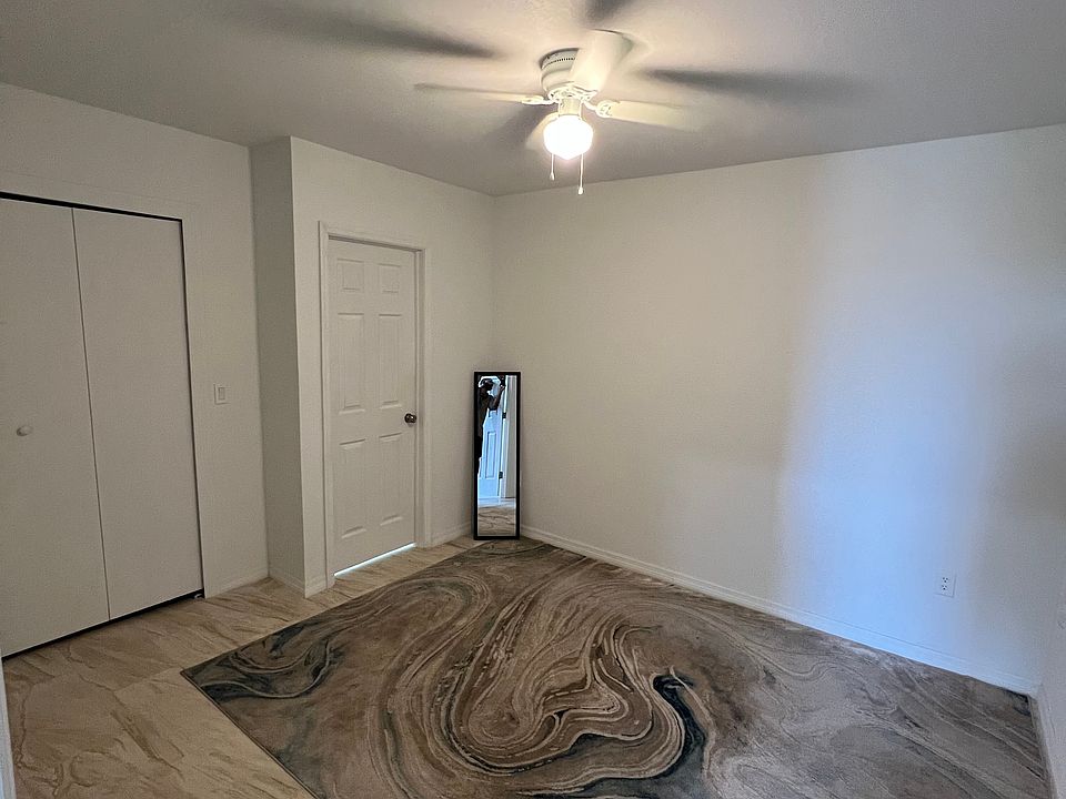 This is the main room, has enough space for a queen/ king bed . The door shown on the right is a spacious closet and on the left is the rest room.
