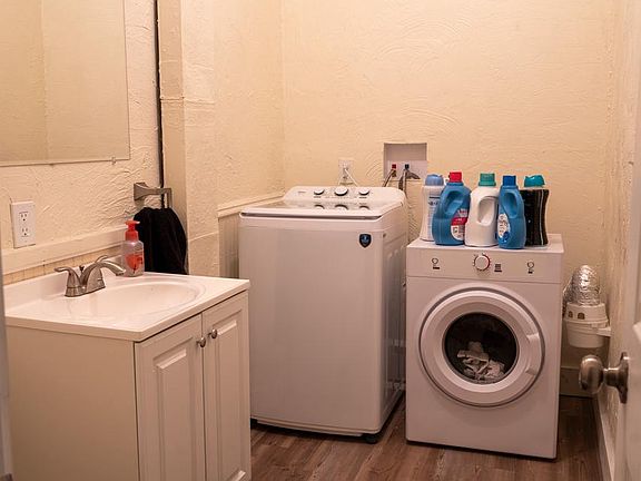 Shared laundry room and guest toilet
