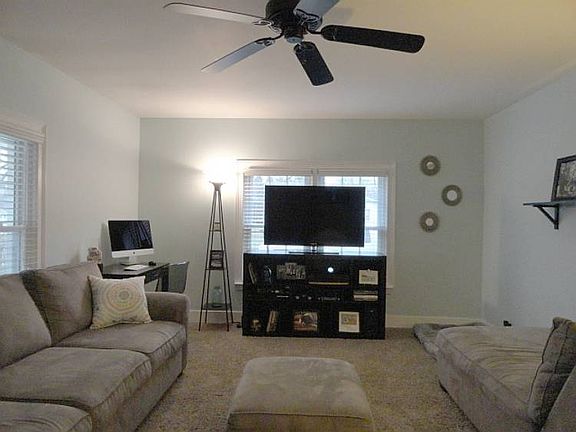 As you step off the covered porch with a commercial grade paint finish, through the newer entrance d