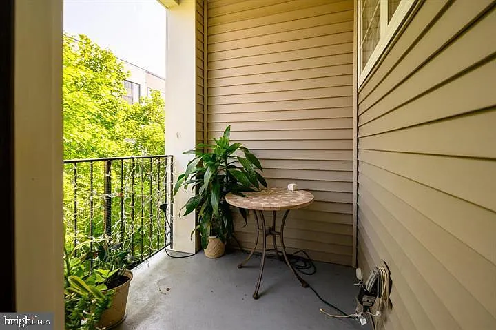 Cozy balcony for AM coffee or evening cocktail.