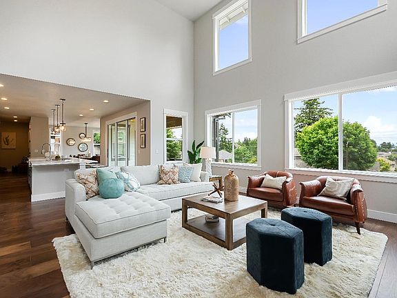 Great room features a dramatic 2-story ceiling