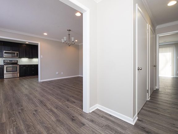 Foyer Through Dining Room to Kitchen