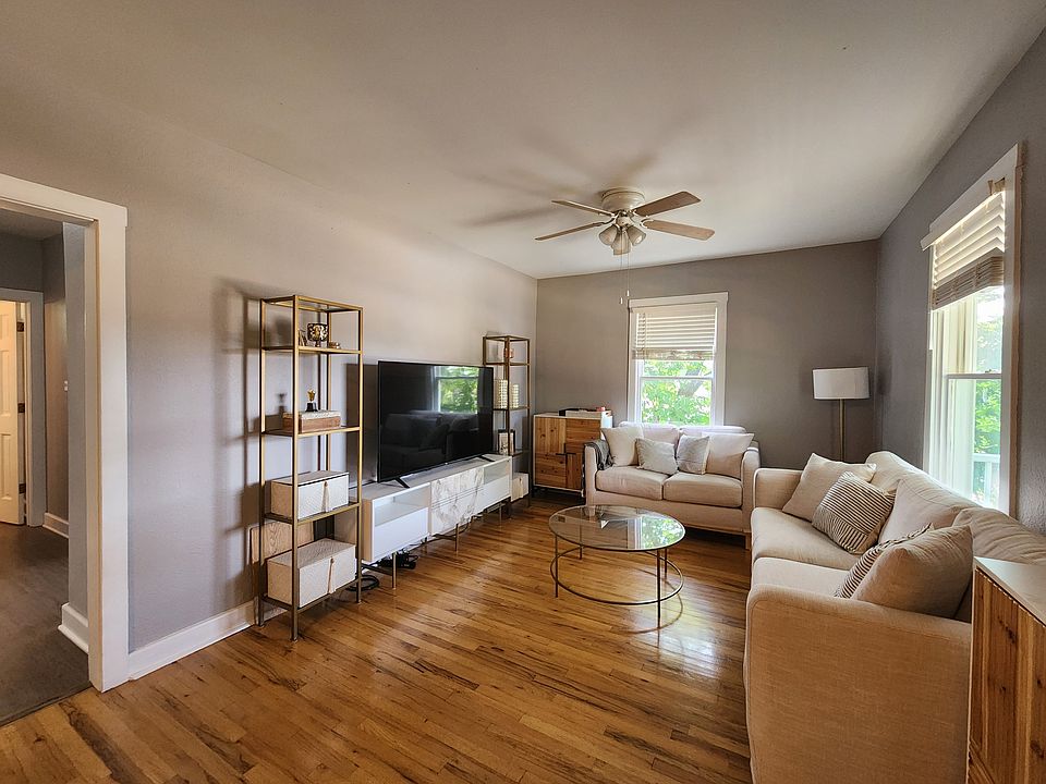 Beautiful refinished hardwood floors and huge living room.