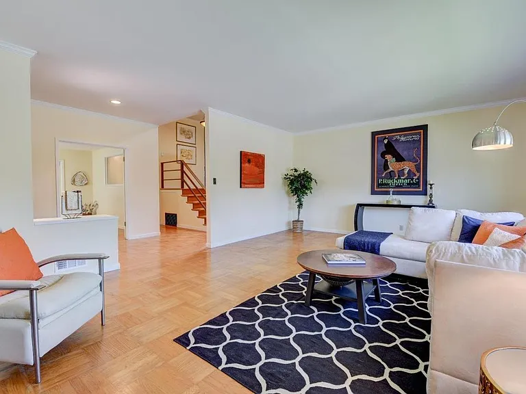 VIEW FROM THE SOUTH EAST OF THE LIVING ROOM