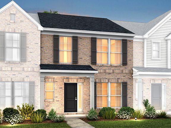Graylyn Exterior 10 features brick, covered front porch and 1 car rear load garage