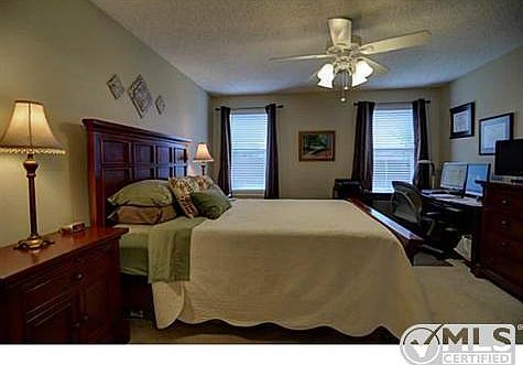 Master Bedroom located at the back corner of the home for quiet