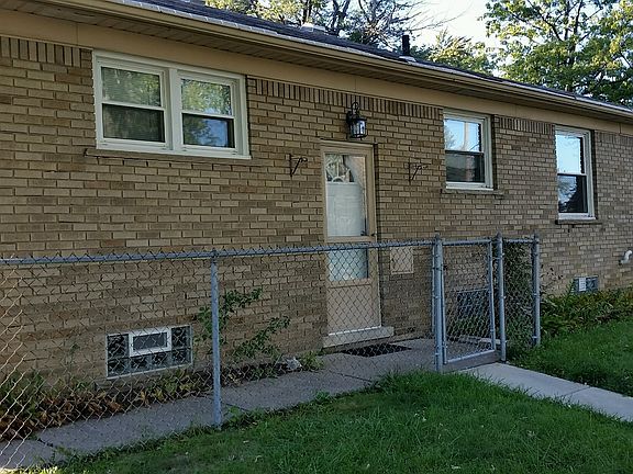 Side of House with New Steel Door