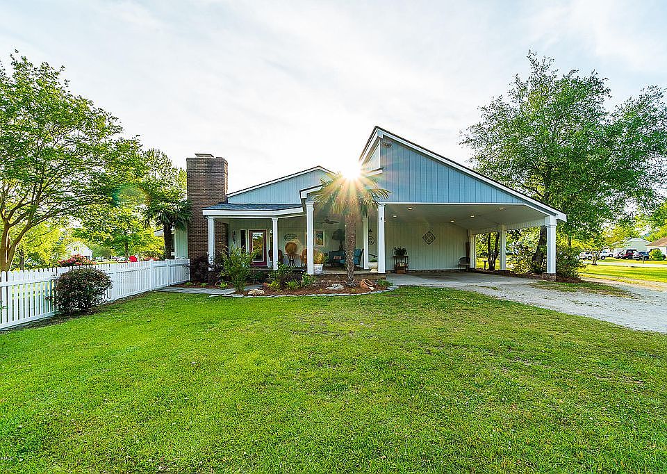 Side carport and deck view