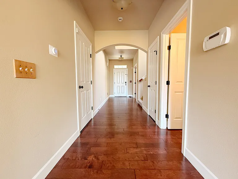 Entry looking out. Bathroom on right.