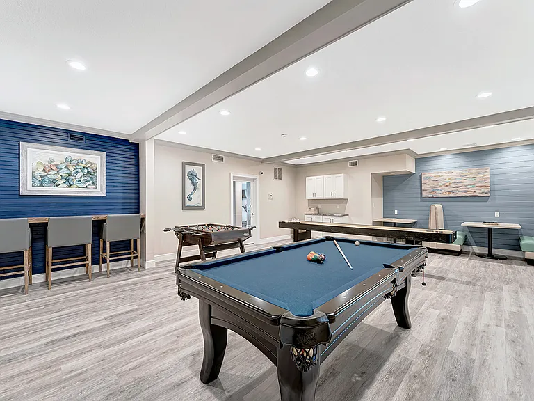 Resident lounge with billiards, foosball, shuffleboard, and free WiFi