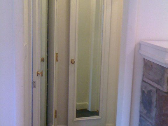 Hallway Mirrored Doors and Full-height Medicine Closet
