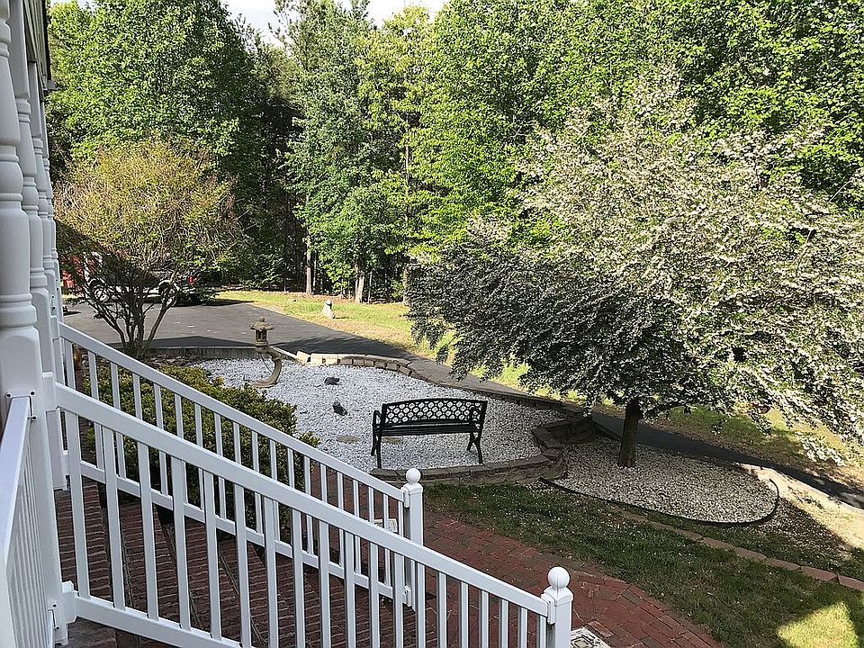 Fnt Yrd view off brick porch