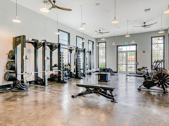Fully equipped fitness center with cardio and weights.