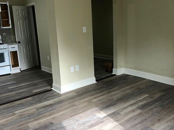 Living room looking back towards kitchen and hallway