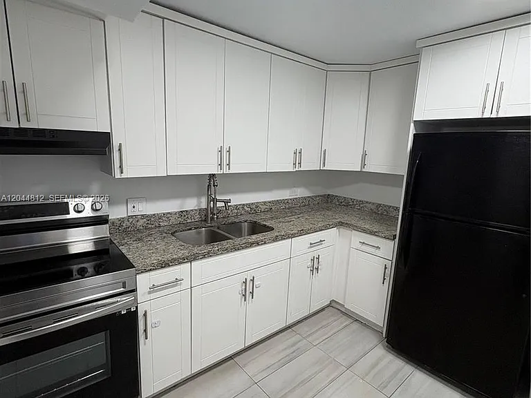 447 NE 195th St #214 — Photo 6
