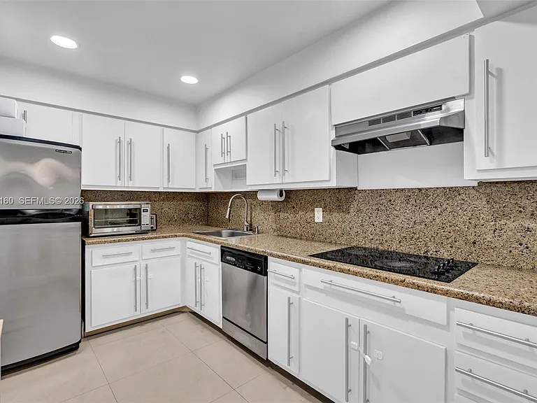 9381 E Bay Harbor Dr #202S — Photo 10