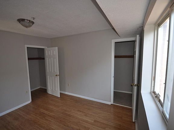Top level bedroom additional view with closets