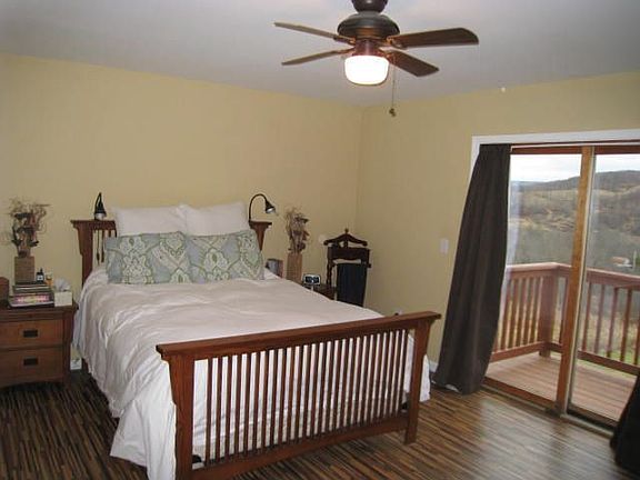 master suite with mountain views and balcony