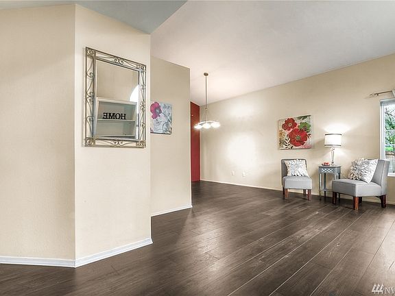 Living room flows into the dining room and feels so open and light. 