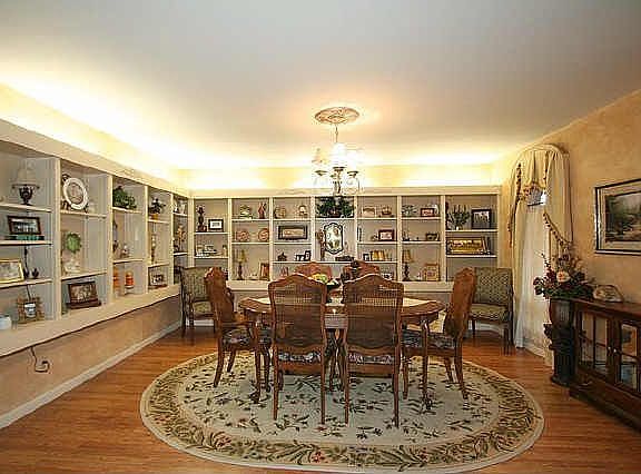 Formal dining with bookcase