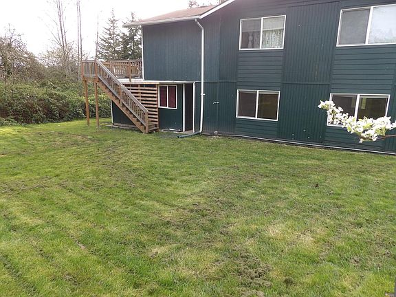 Backyard is partially fenced.