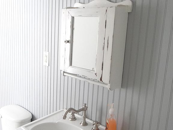 Newly renovated bathroom. Old medicine cupboard for your supplies