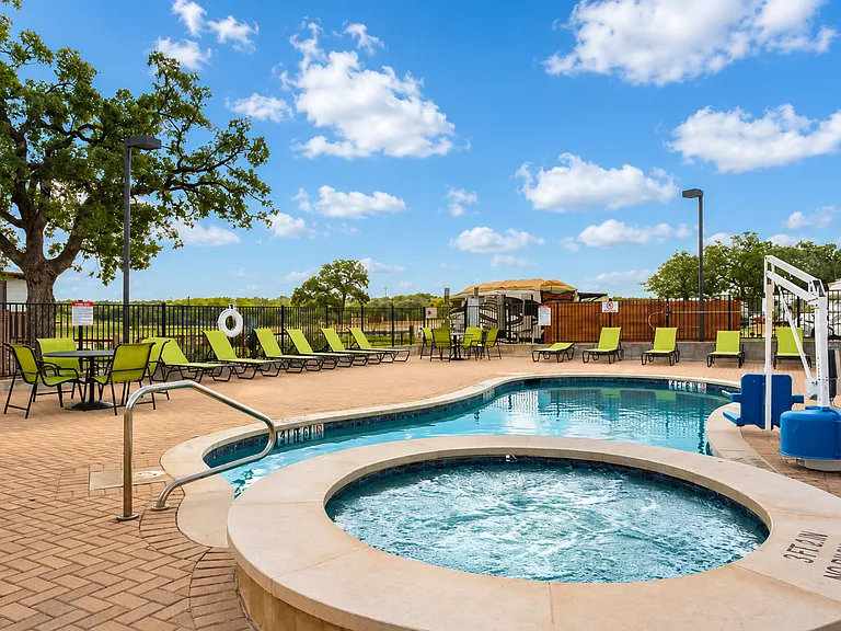 Resort-style pool and hot tub, a short walk from your front door.