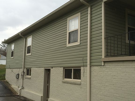 Side with concrete pad