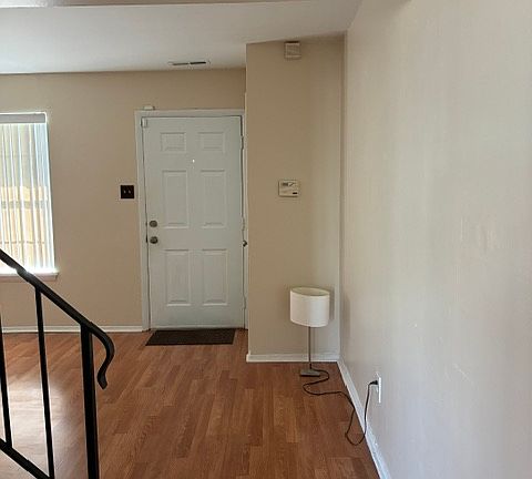 view of lioving room from dining and kitchen area