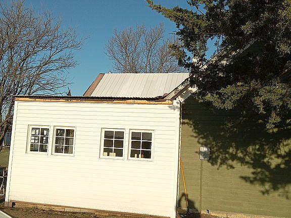 New white metal roofing.