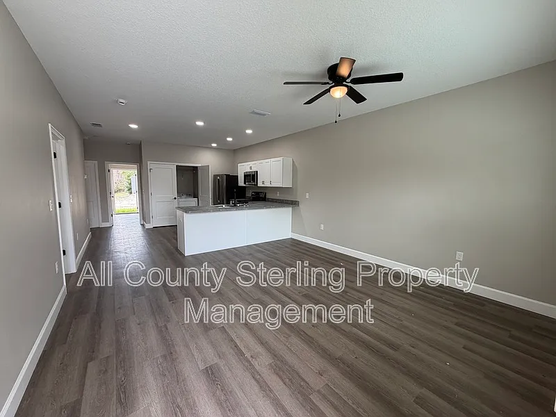 Building Photo - 1390 SE Magnolia Loop #104