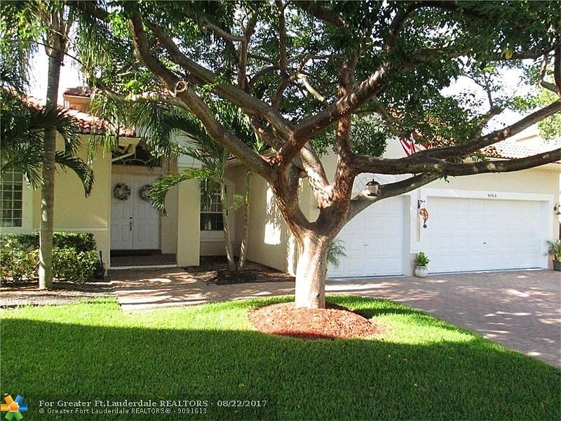 Welcoming 4 Bedroom; 2 Bath; 3 Car Garage; Pool; Partially Screened Patio Home12 Ceilings Most Rooms