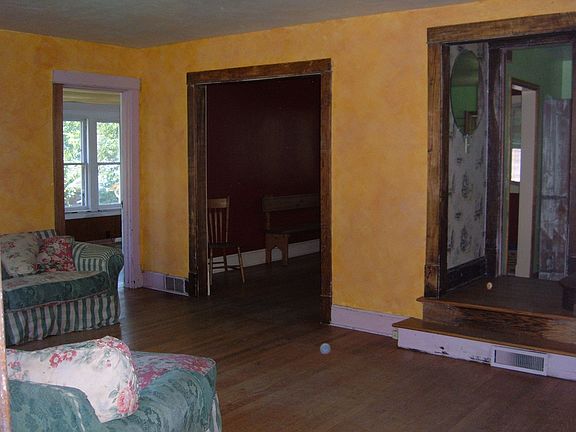 View From front door of stairs & Dining Entry then sun Porch