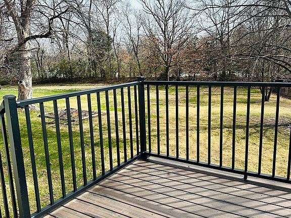 Deck overlooking big back yard
