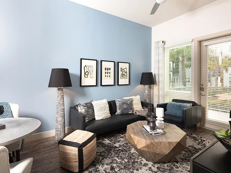 Experience the perfect space to gather and relax in a living room designed for comfort and warmth.