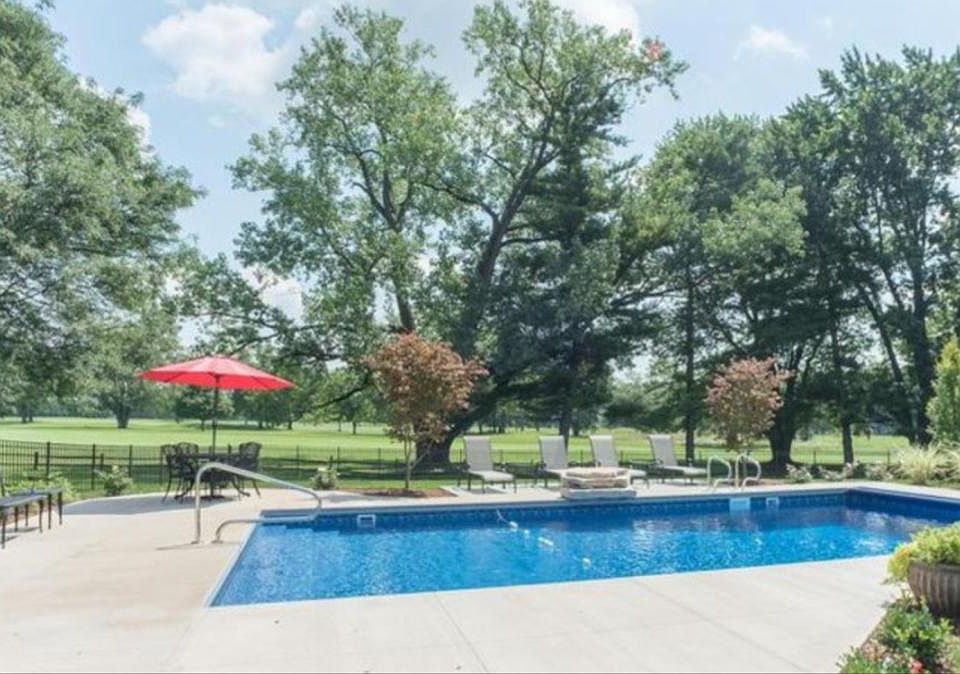 Pool overlooking golf course