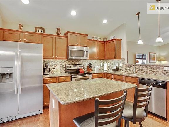 Easy to prepare any meal - with both island and peninsula/bar to offer seating to guests!