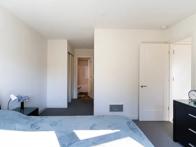 1st floor bedroom hallway to closet and private bathroom