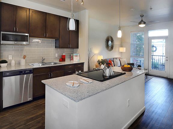 Kitchen with Stainless Steel Appliances and Granite Countertops