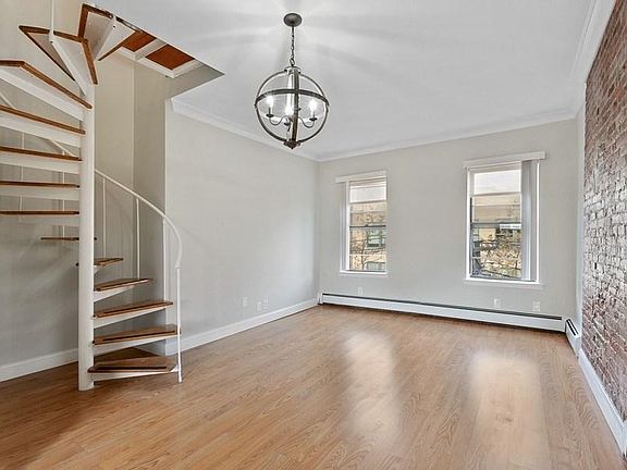 5th image of 133 Grand St APT 4A