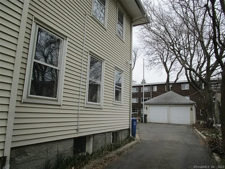 Parking for one car in driveway; no garage available