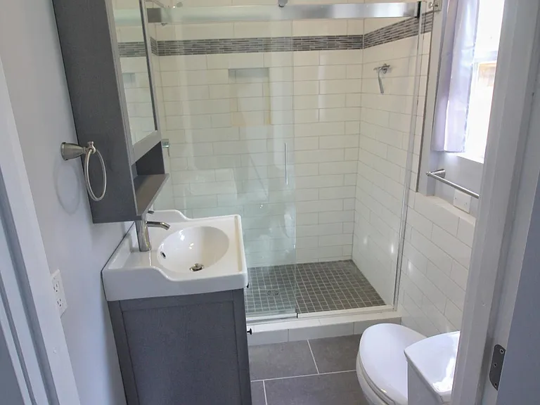 View of the tiled bathroom