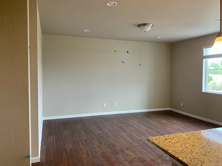Main level living area with view overlooking open space