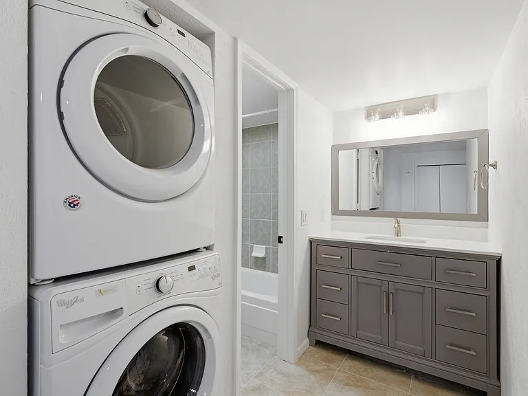 Primary bathroom and washer/dryer