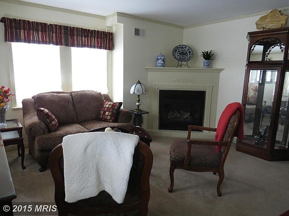 Living Room w/beautiful corner fireplace
